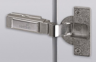 Závěs HET INTERMAT 9935 naložený pro velkou tloušťku dveří do 43 mm 95° TH52 s pružinou k přišroubování